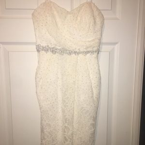 Strapless white lace bodycon dress
